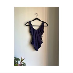 One-piece swimsuit with netted sides